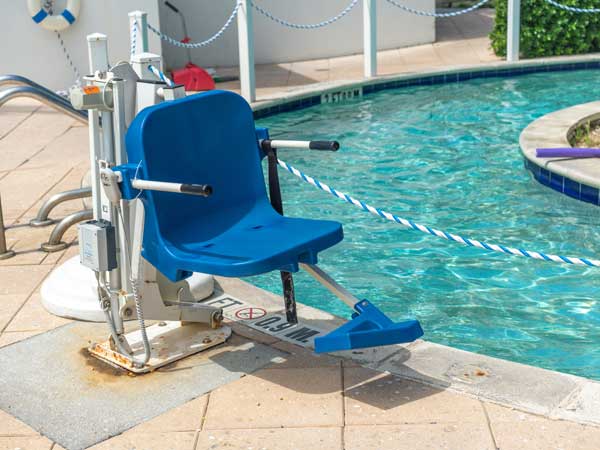 Pelican beach ada pool lift.