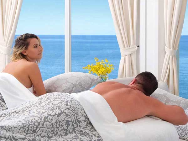 Couples massage with an ocean view.