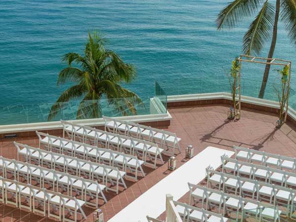 Rooftop wedding with an ocean view.