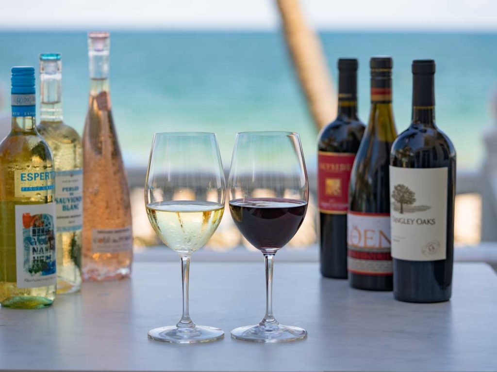 Wine table with two glasses of wine.