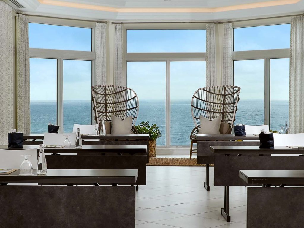 Socially distanced meeting with an ocean view.