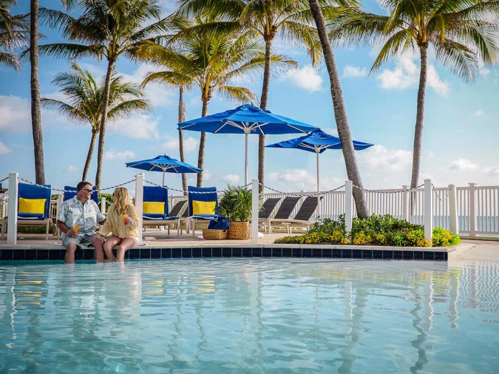 Couple By The Pelican Beach Pool.